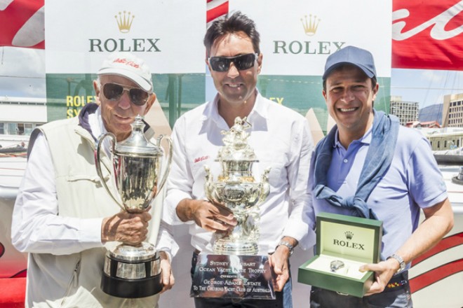 Bob Oatley and Mark Richard with the silverware as Patrick Boutellier presents the Rolex Yacht-Master © ROLEX-Carlo Borlenghi